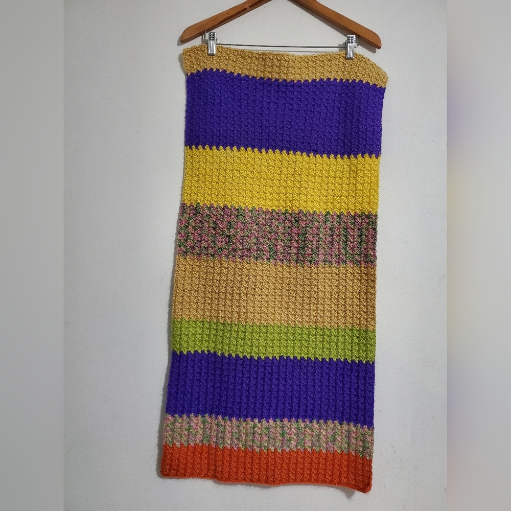 Handmade, multi-colored crochet lap  blanket.